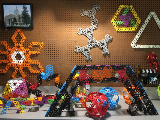 Photo of a workbench with Qubits on it